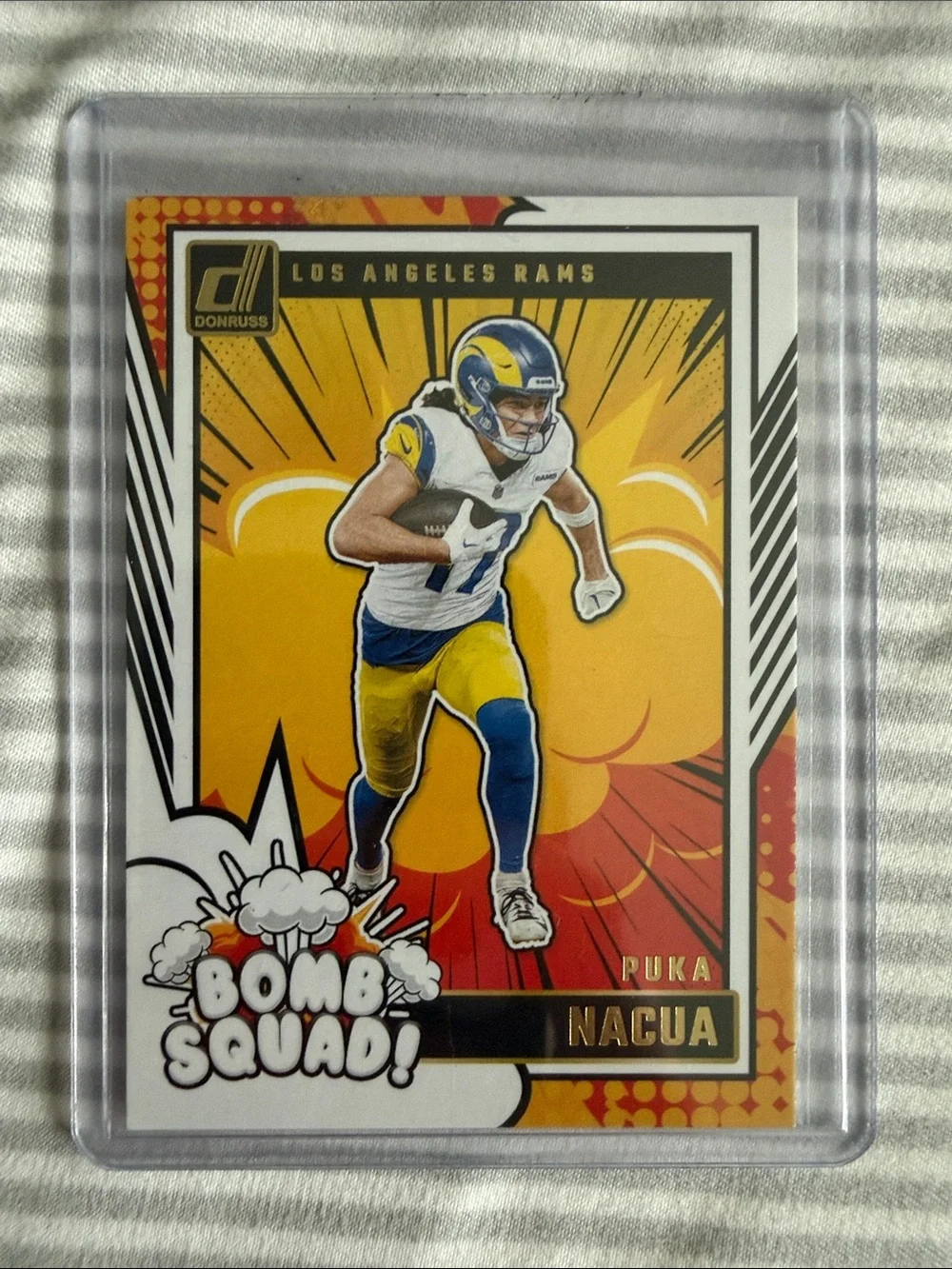Donruss Puka Nacua Bomb Squad Football Trading Card - Yellow/Blue